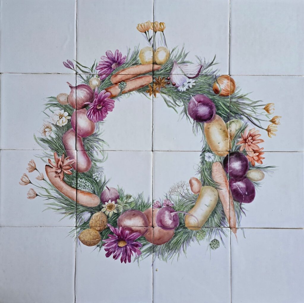 tegeltableau met een krans van natuur en oogst